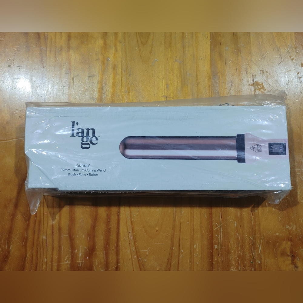 BRAND NEW! never opened curling iron
